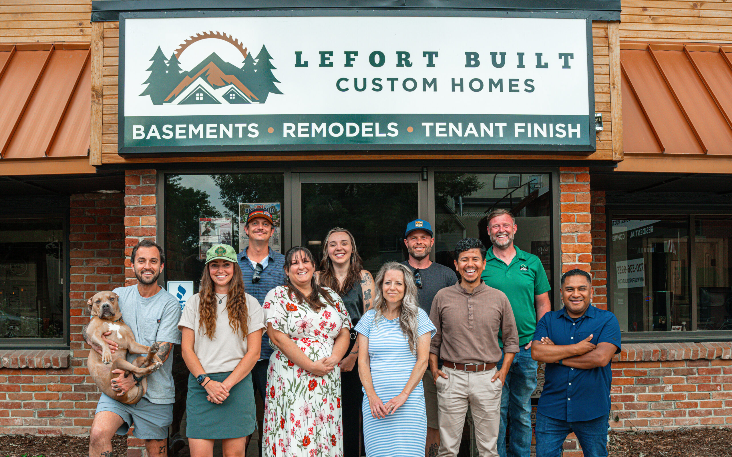 Lefort's Team all together in-front of their office in Berthoud Co.